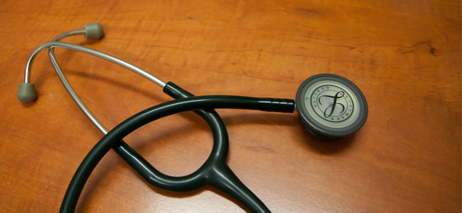 The stethoscope of GP Frank Poelstra on wooden table
